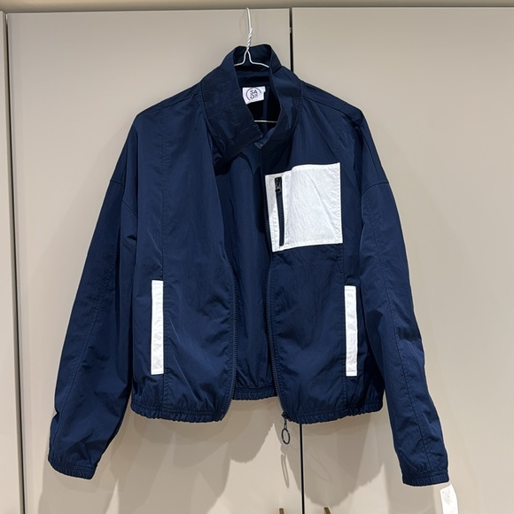 New SAGE Blue Windbreaker with White Accents – Size Small, Sleek & Lightweight - Picture 3 of 5